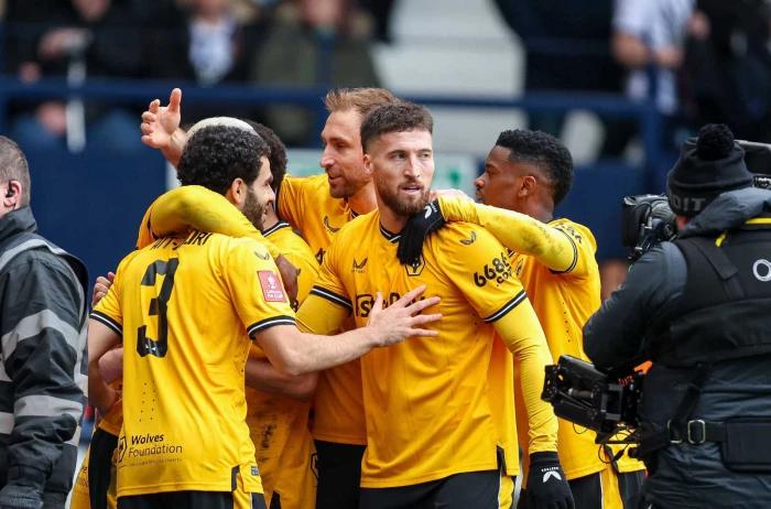 Wolves advance in FA Cup after crowd trouble causes stoppage during the match
