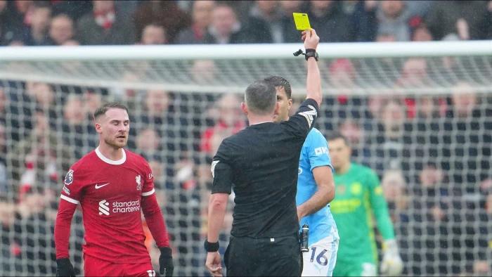 Man City's Kyle Walker commends Michael Oliver's composure amidst Anfield drama