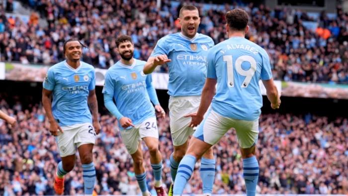 Man City move to the top of the Premier League table after emphatic victory over Luton