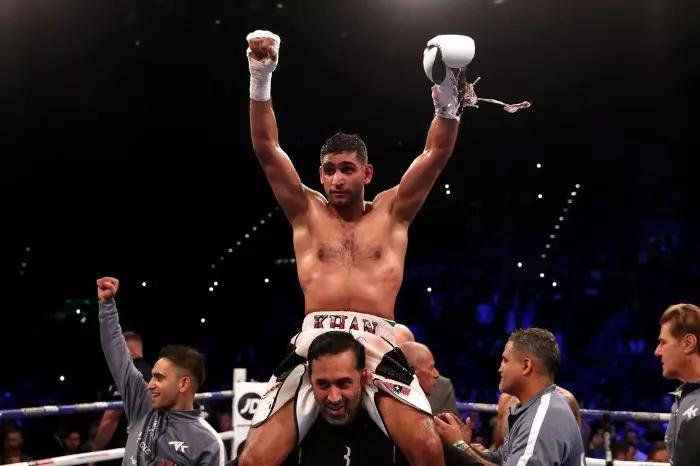 Amir Khan claims Floyd Mayweather is trying to tempt him out of retirement