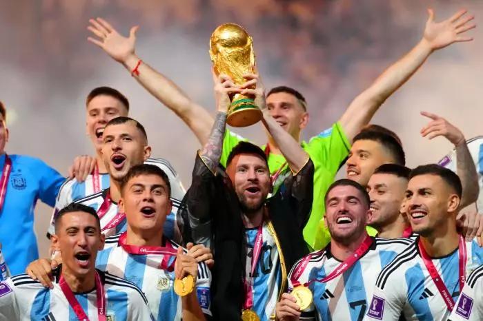 Argentina captain Lionel Messi lifts the FIFA World Cup trophy