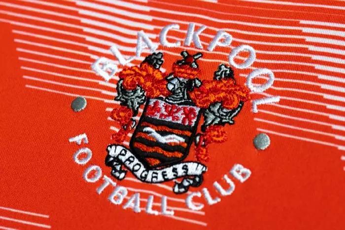 Blackpool badge on shirt