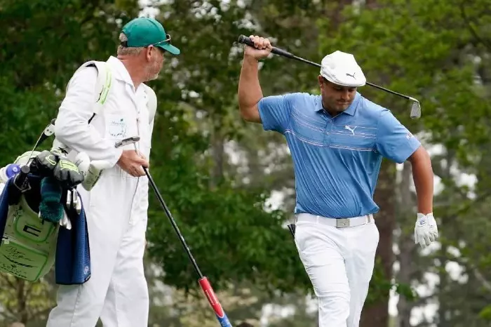 Bryson DeChambeau reacts to a poor tee shot at Augusta National