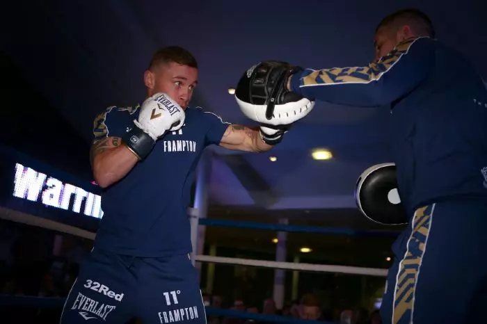 Jamie Moore on the pads with Carl Frampton