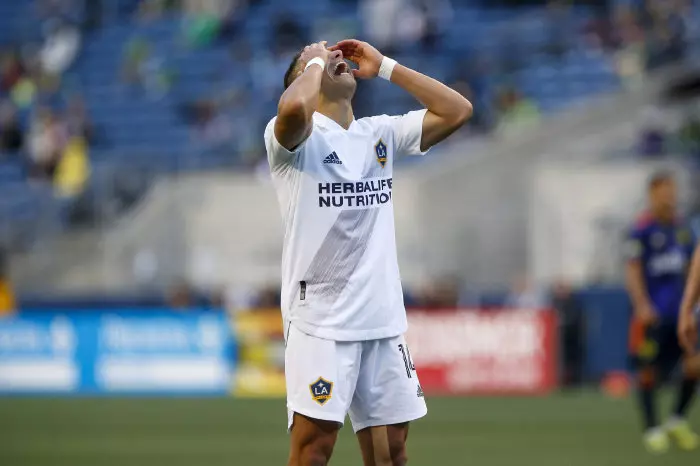 Los Angeles Galaxy forward Javier Hernandez (14) reacts after missing a goal opportunity against the Seattle Sounders FC during the second half at Lumen Field.