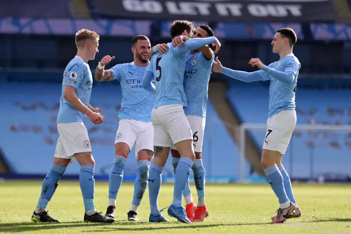 John Stones celebrates his winner against West Ham