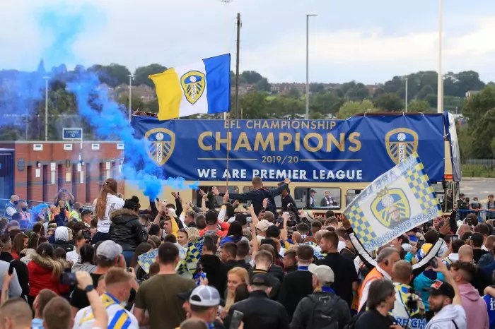 Leeds United supporters gather outside Elland Road after Leeds gain promotion to the Premier League