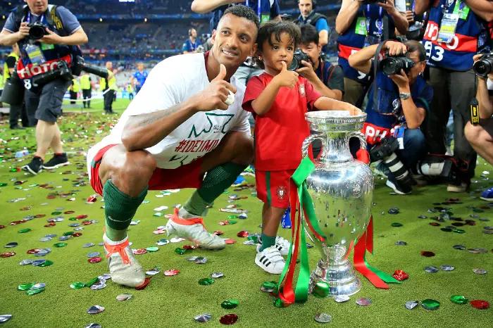 Nani celebrates with the European Championship trophy after winning with Portugal, July 10, 2016