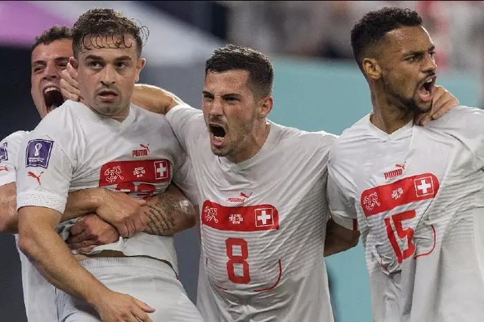 Switzerland reach last 16 after heated World Cup victory over Serbia