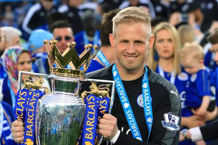 Leicester City goalkeeper Kasper Schmeichel with the trophy as the team celebrate winning the Barclays Premier League, after the match at the King Power Stadium, Leicester.
