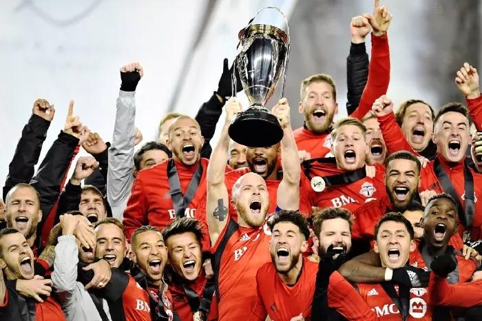 Toronto FC celebrate winning the 2017 MLS Cup with captain Michael Bradley lifting the trophy