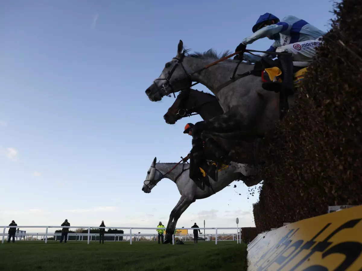 Highland Hunter (right) winning the Betfair Exchange London National Handicap Chase