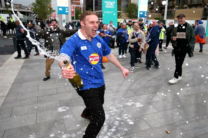 Leicester fans celebrate outside Wembley