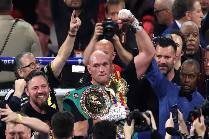 Fury produces stunning fight to stop Wilder and win WBC world heavyweight title