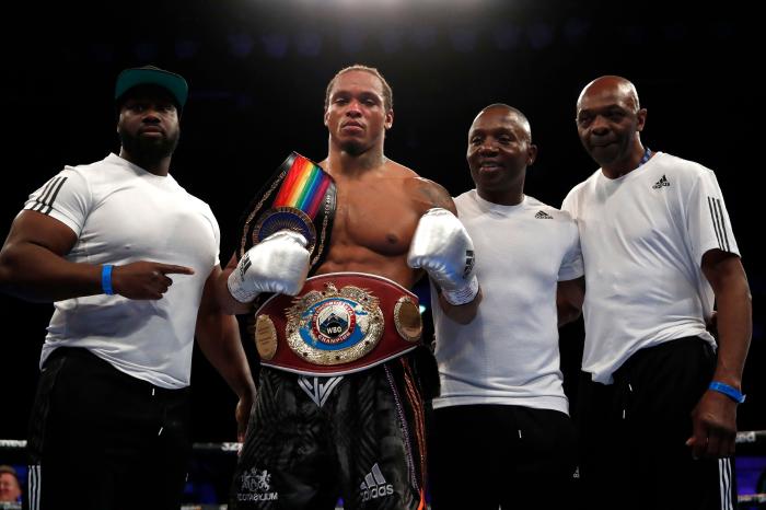 Anthony Yarde celebrates with the belt after his win against Lyndon Arthur