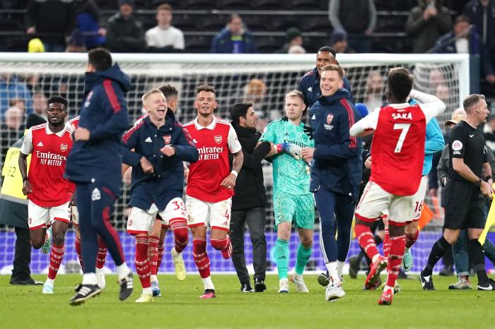 Arsenal goalkeeper Aaron Ramsdale celebrates with team-mates