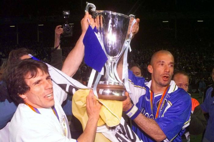 Chelsea teammates Gianfranco Zola, left and Gianluca Vialli holding up the Cup Winner's Cup