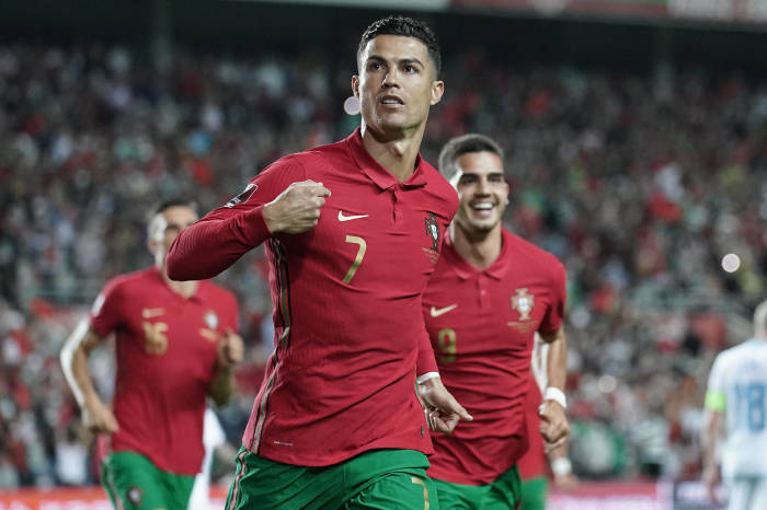 Cristiano Ronaldo celebrates his hat-trick against Luxembourg