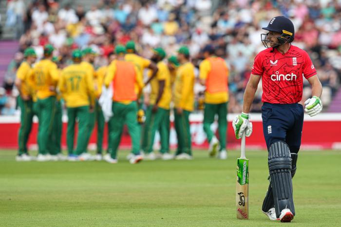 England's Jos Buttler leave field after losing his wicket