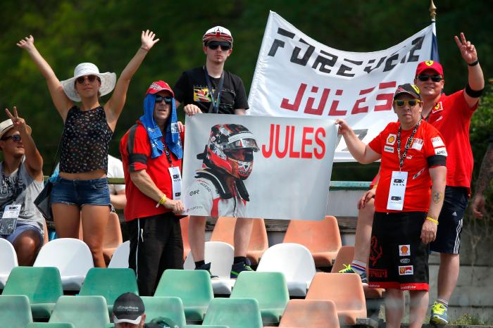 F1 supporters hold a banner in memoriam of former French Formula One driver Jules Bianchi - October 2022