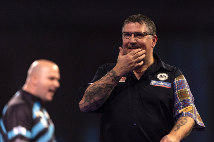Gary Anderson needed to change darts and glasses before beating Rob Cross
