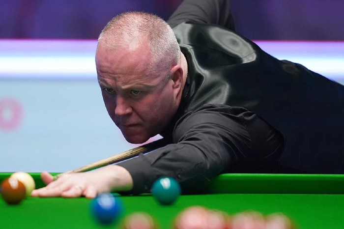 John Higgins overcomes 'embarrassment' to secure fine win