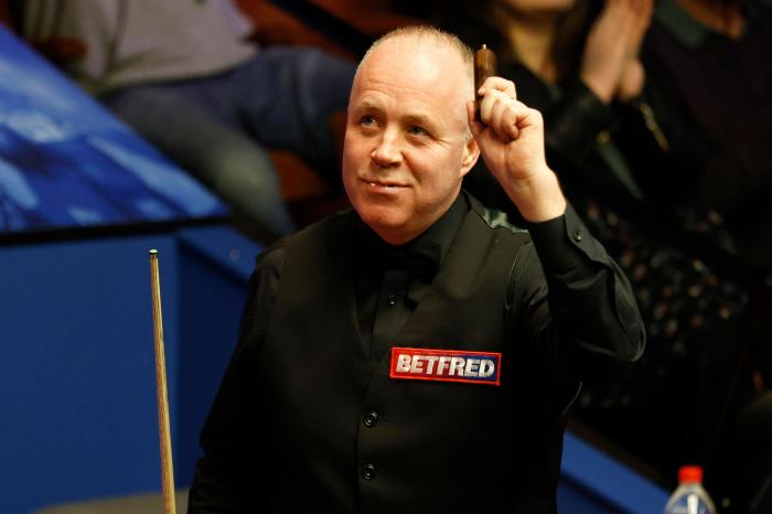 John Higgins in action at the Crucible