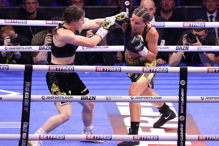 Katie Taylor (left) in action against Chantelle Cameron for the undisputed Super-Lightweight World Titles at the 3Arena in Dublin - May 2023
