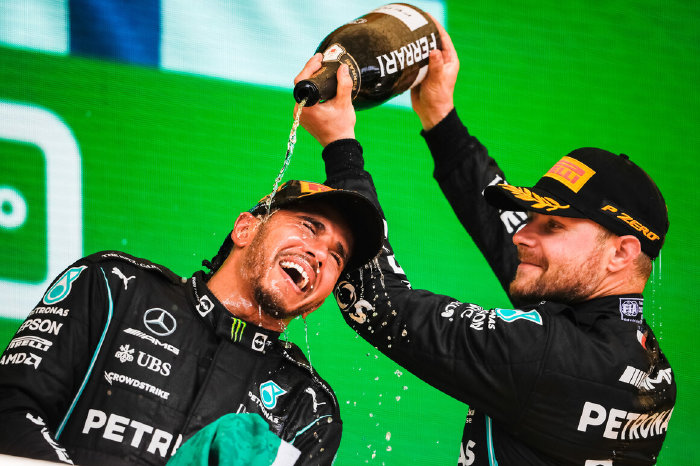 Lewis Hamilton and Valtteri Bottas celebrate at Sao Paulo GP