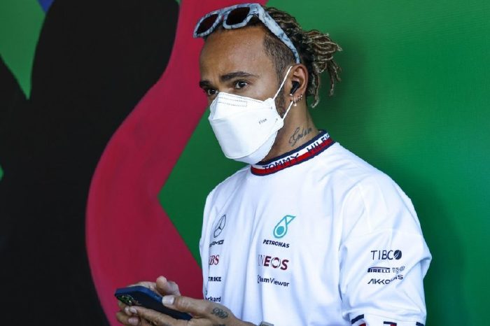 Lewis Hamilton with phone