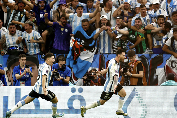 Lionel Messi celebrates for Argentina