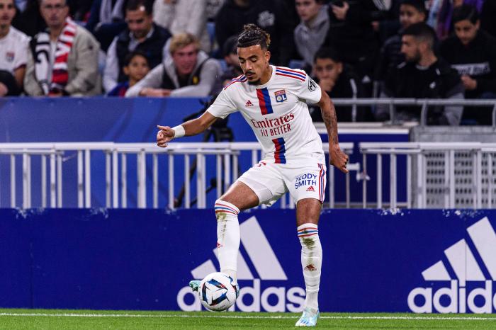 Malo Gusto of Lyon in action during the Ligue 1 match between Olympique Lyonnais and LOSC Lille at Groupama Stadium