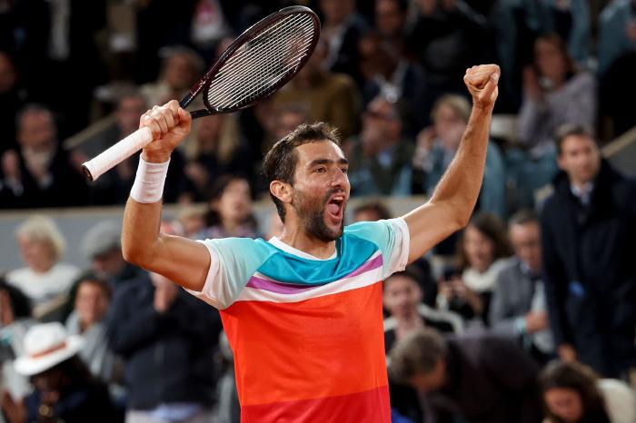 Marin Cilic celebrates beating Daniil Medvedev at French Open