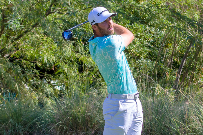 The American holds an early two shot advantage over course specialist Aaron Wise on the El Camaleon course at Mayakoba.