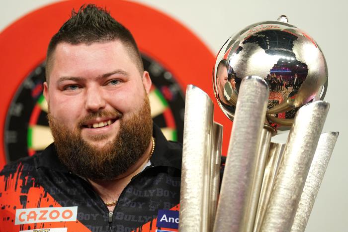 Michael Smith with World Championship trophy