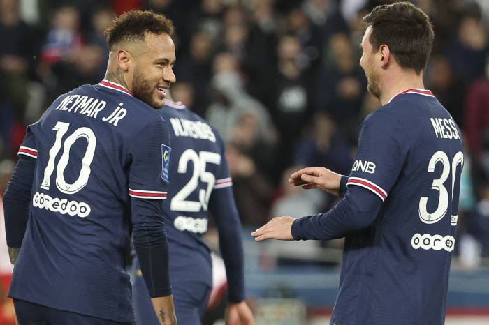Neymar and Lionel Messi celebrate Ligue 1 title success