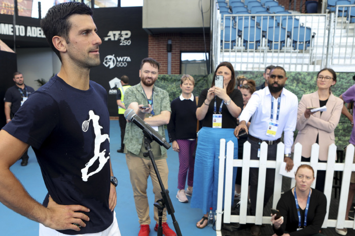 Novak Djokovic speaks to the press