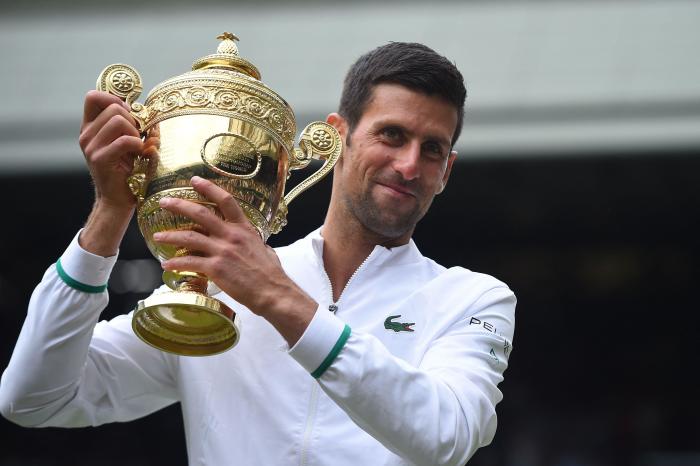 Novak Djokovic with Wimbledon trophy