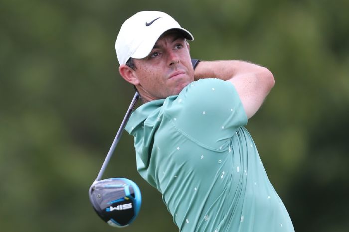Rory McIlroy watches his shot from the 12th tee during the second round of the BMW Championship