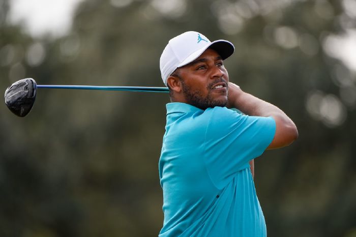 Harold Varner III watches his tee shot on 16 during Rd1 of the HP Enterprise Houston Open
