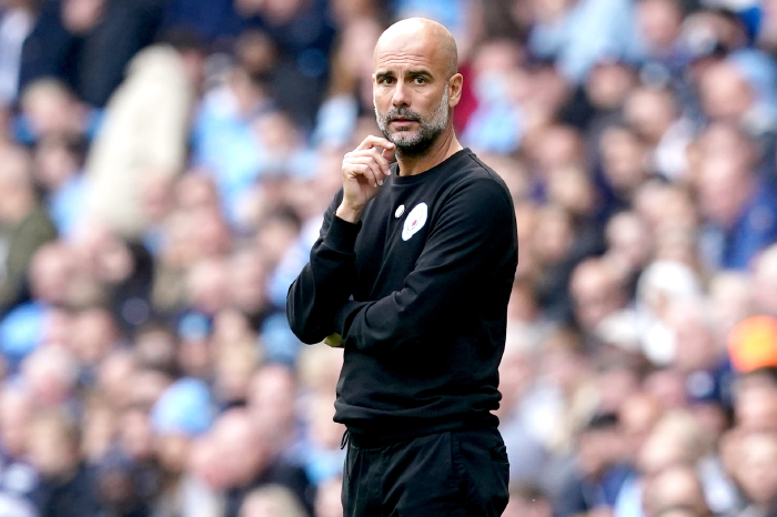 Guardiola one of 14 Man City staff members who tested positive for COVID
