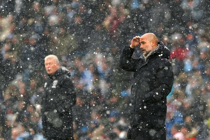 Pep Guardiola in the snow as Manchester City face West Ham
