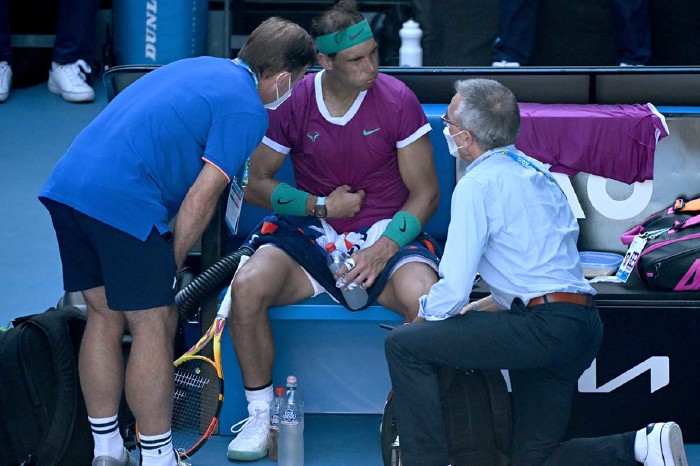 Rafael Nadal receiving treatment for injury