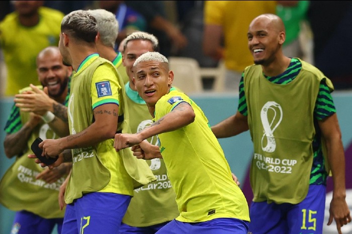 Richarlison celebrates scoring for Brazil
