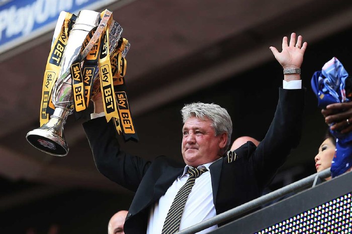 Steve Bruce with play offs trophy for Hull