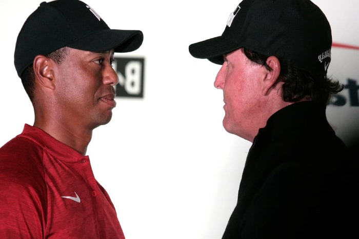 Tiger Woods beats Phil Mickelson