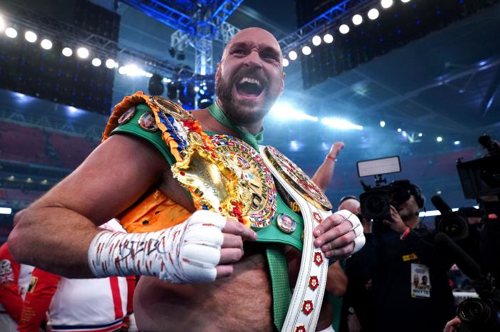 Tyson Fury with his belt after beating Dillian Whyte