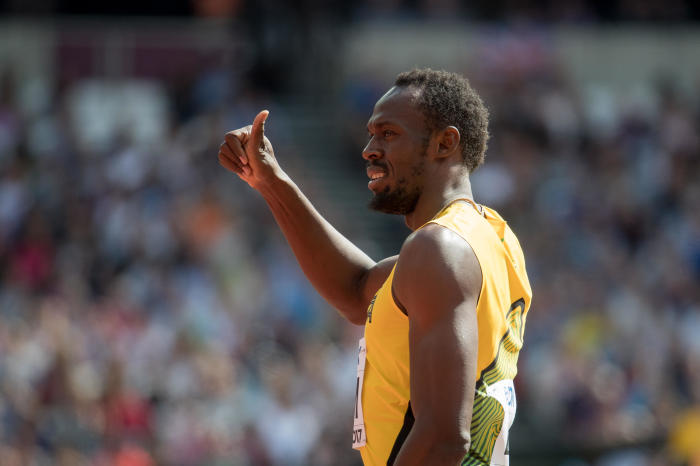 Usain Bolt of Jamaica gives a thumb up before his 4x100 metre heat during the IAAF World Athletics Championships