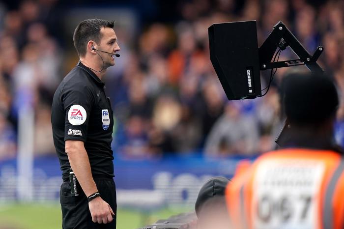 Referee Andrew Madley using VAR