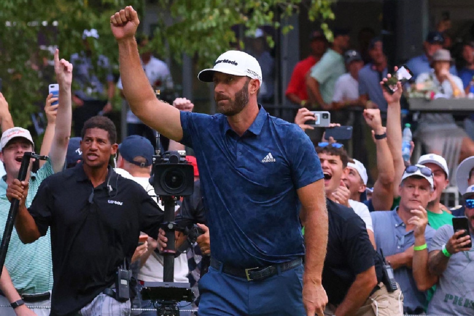 Dustin Johnson holes monster eagle putt to emerge victorious at LIV Golf event in Boston